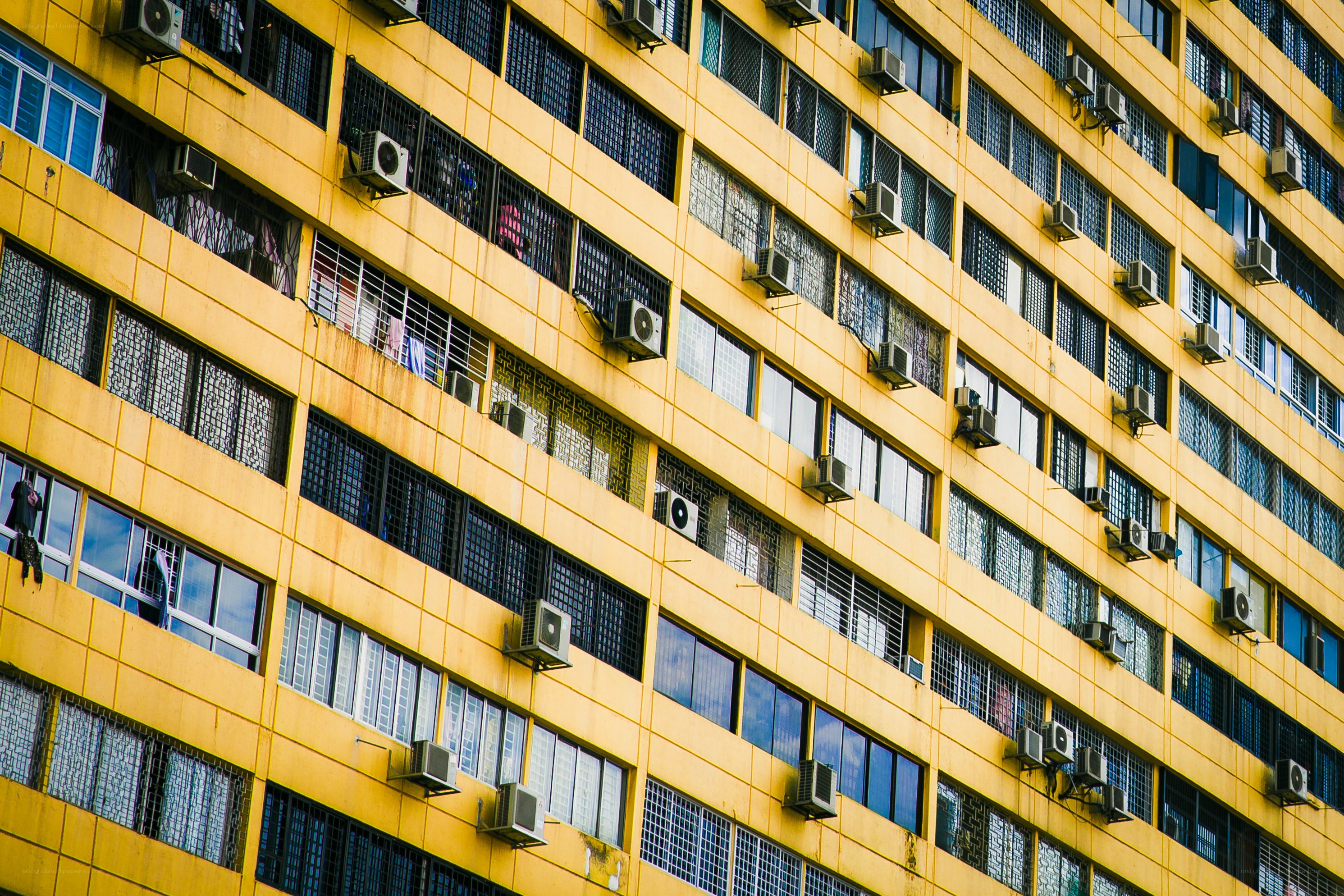 yellow apartment building facade