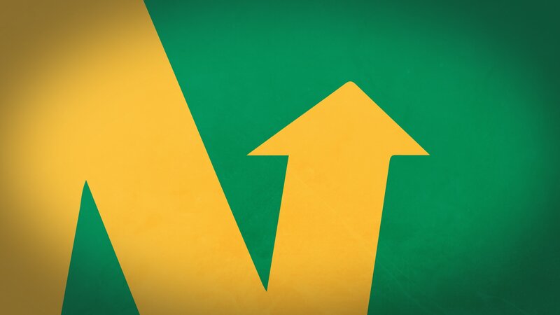 yellow arrow on green background