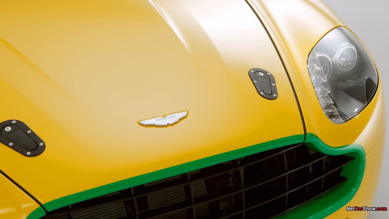 yellow aston martin front view