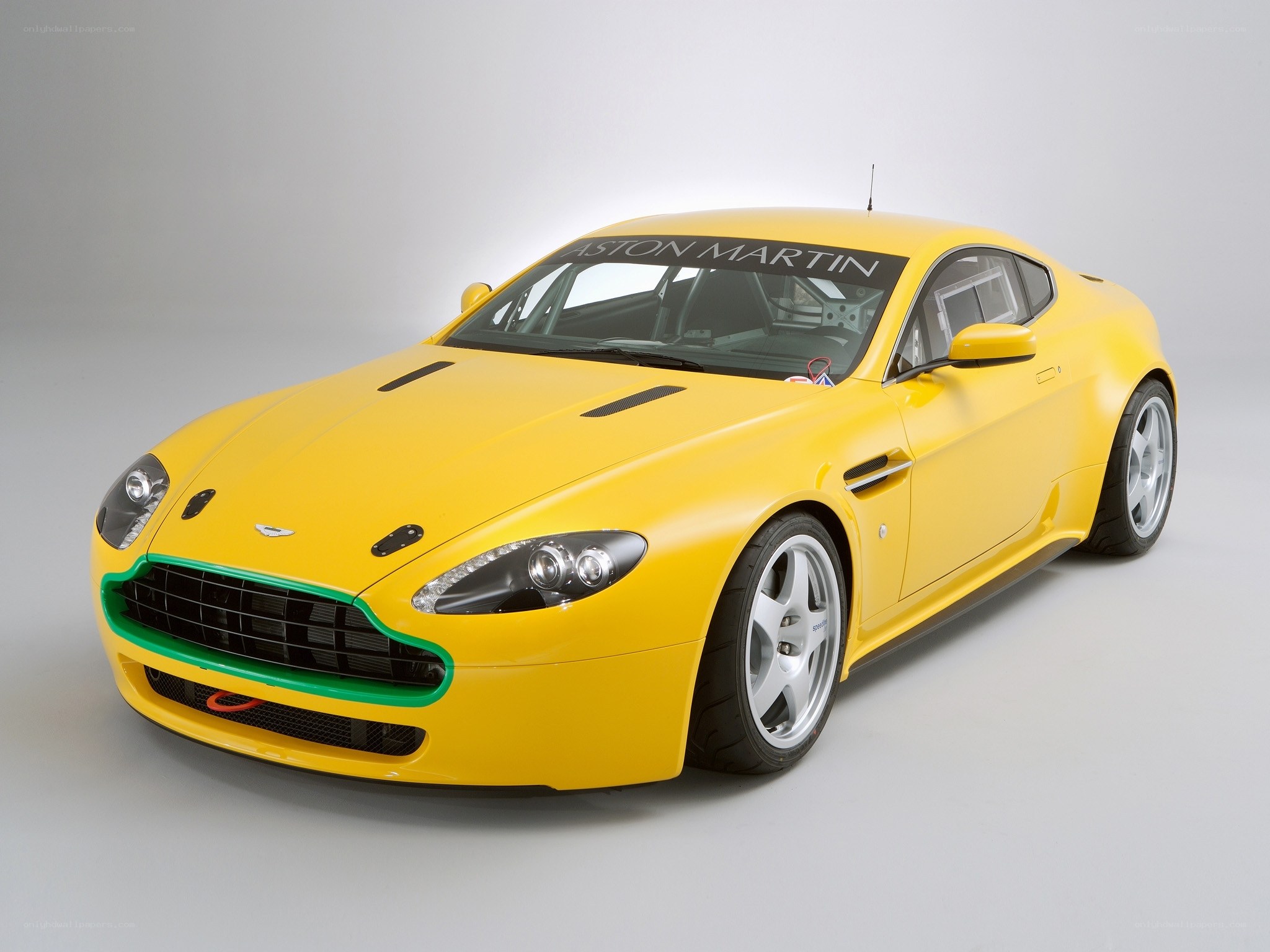 Yellow Aston Martin race car