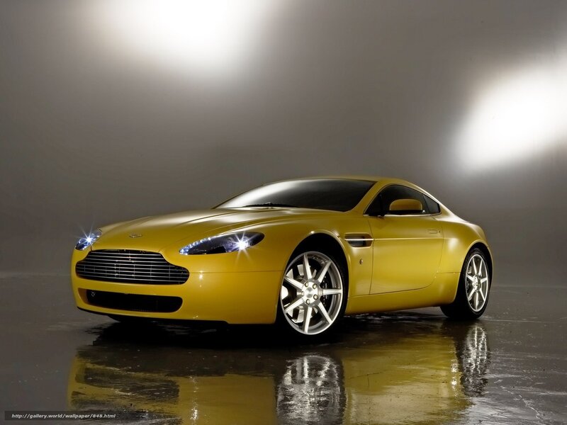 Yellow Aston Martin sports car