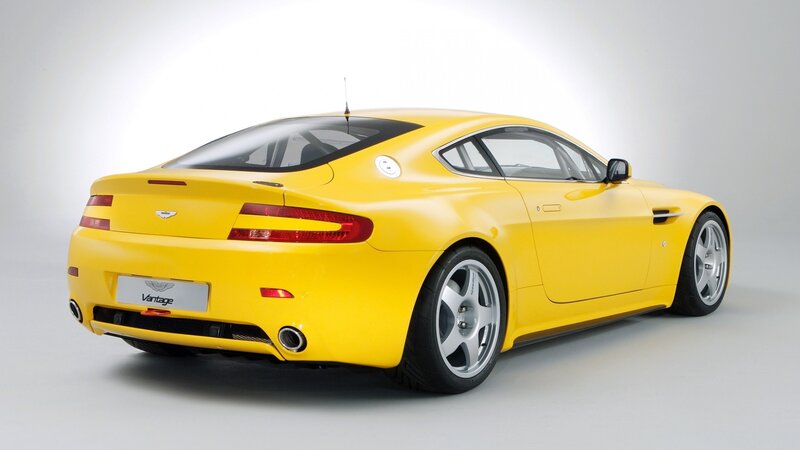 yellow aston martin vantage