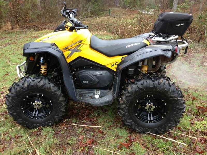 Yellow Atv on Grass