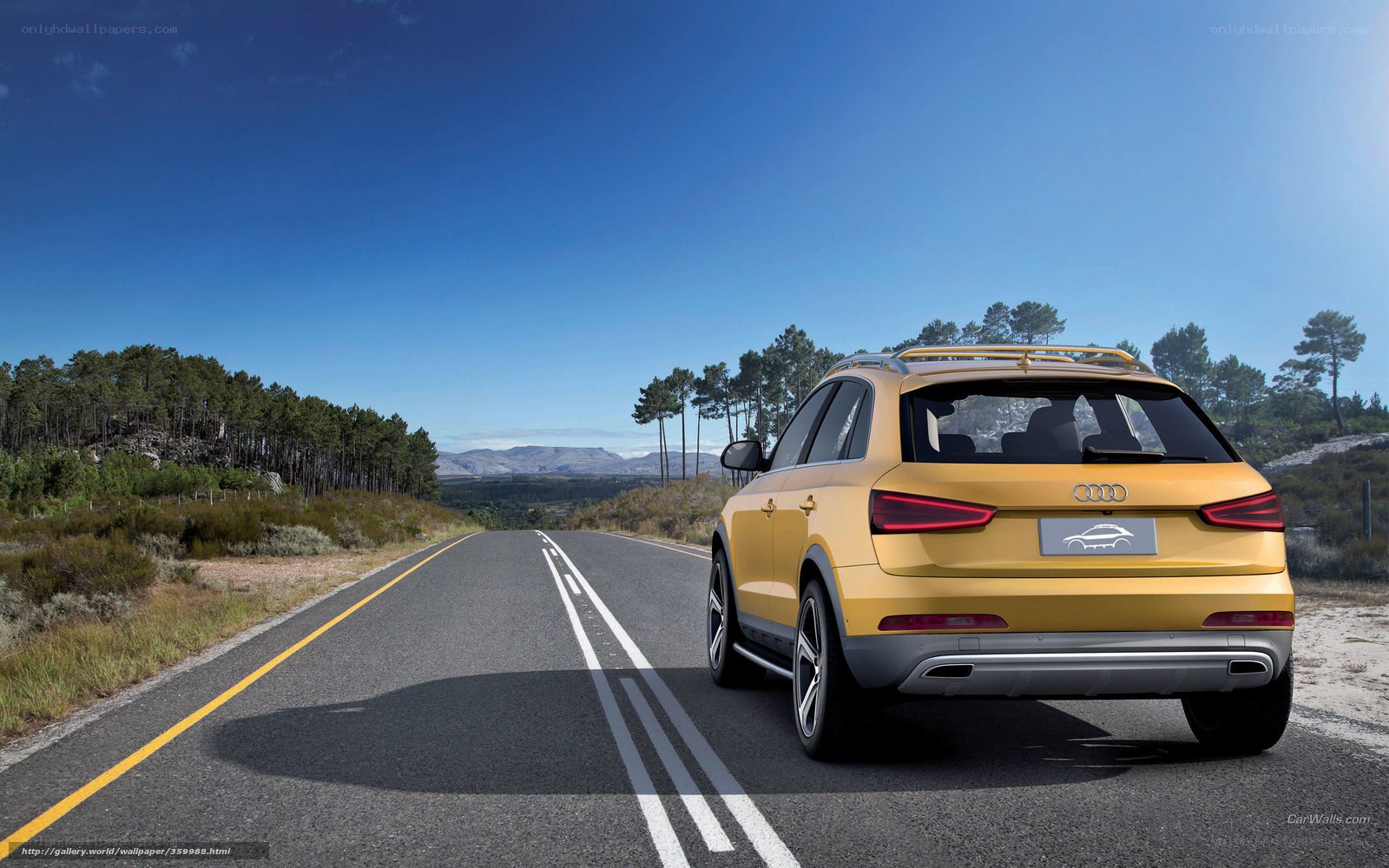 Yellow Audi on a scenic road