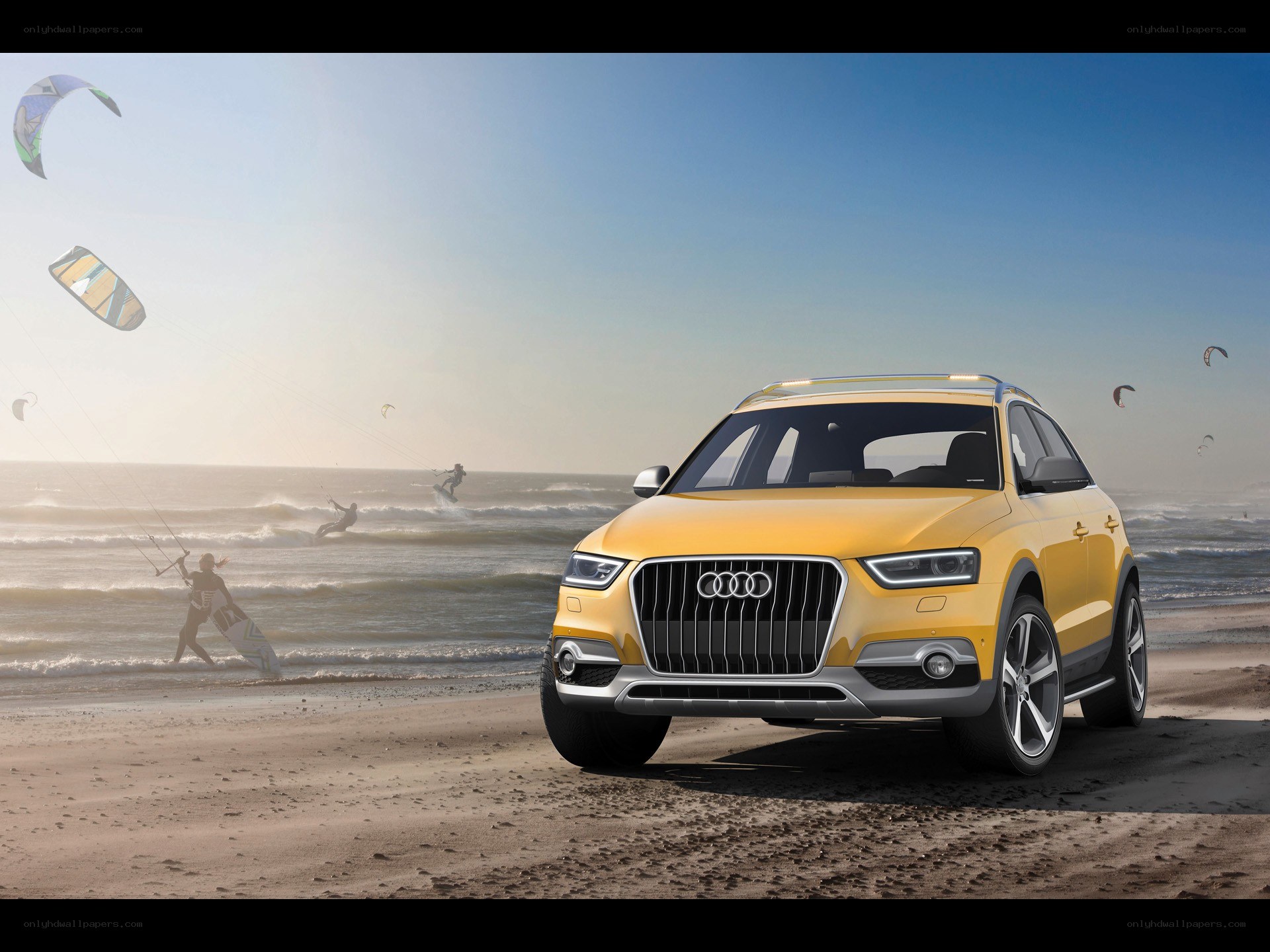 Yellow Audi on the beach