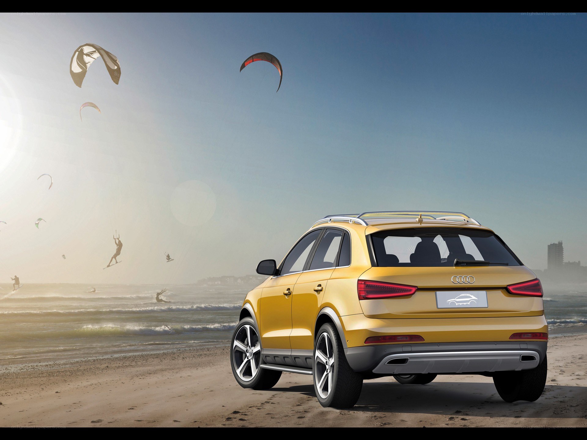 Yellow Audi on the beach