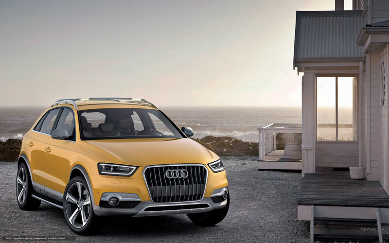 Yellow Audi Q3 by the sea
