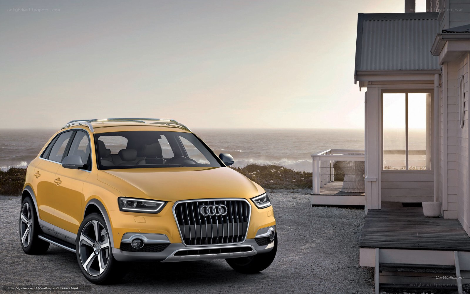 Yellow Audi Q3 by the sea