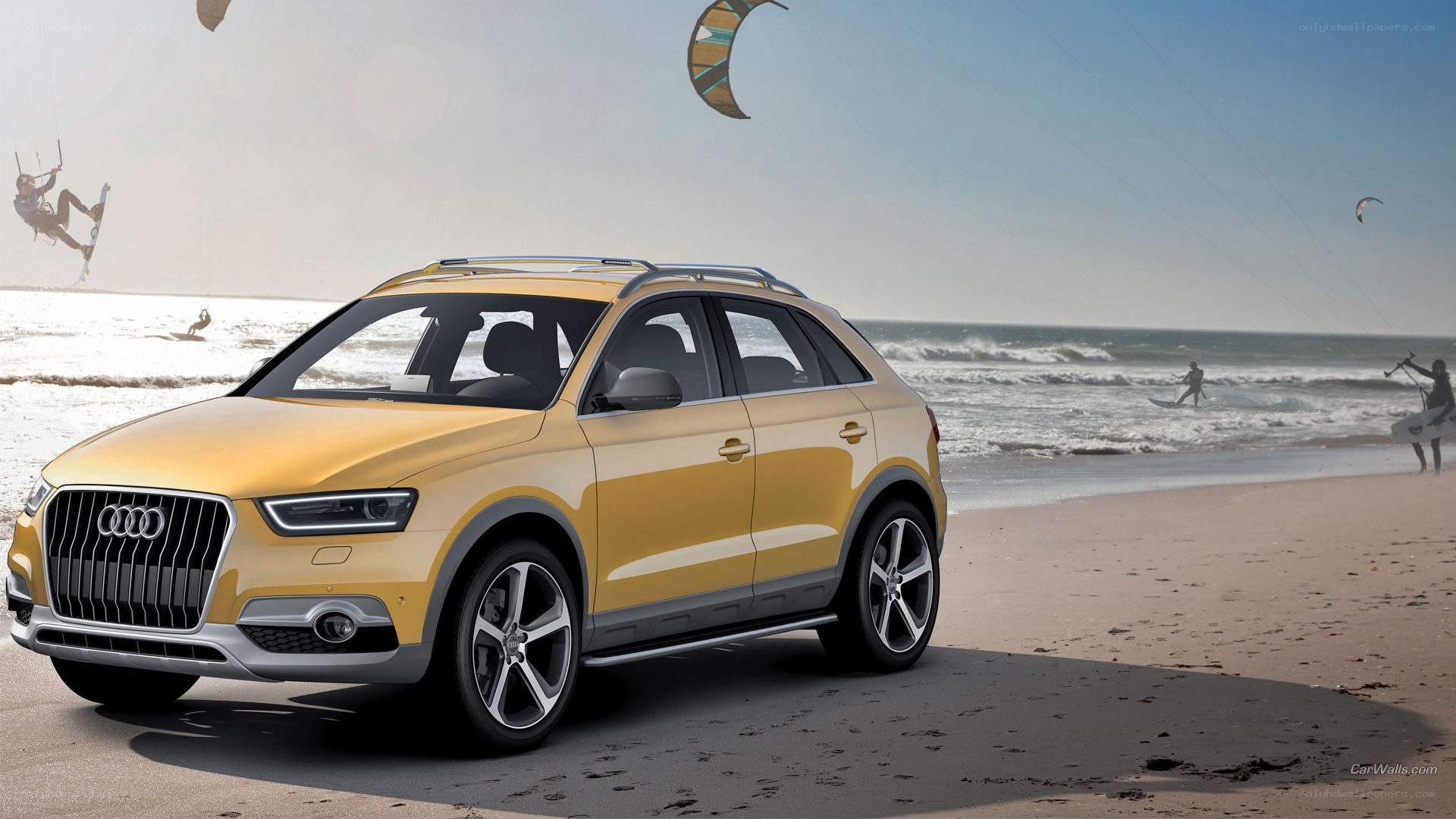 Yellow Audi Q3 on beach