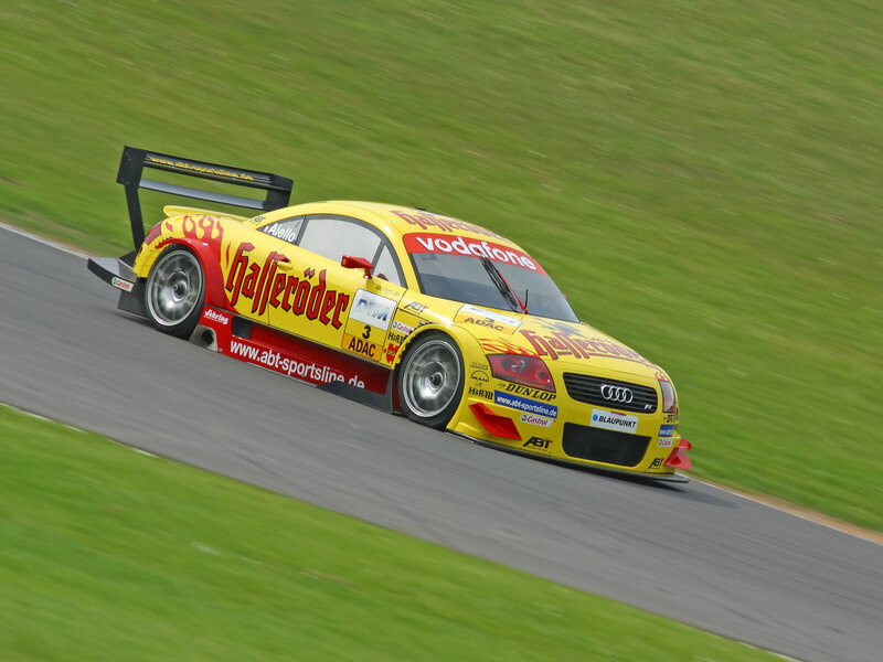 Yellow Audi race car on track