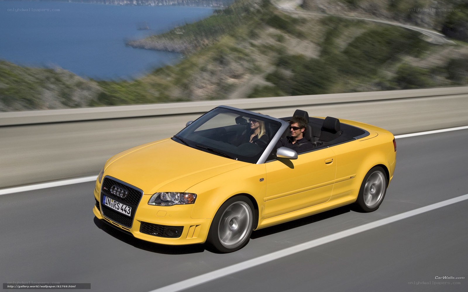 Yellow Audi RS4 convertible driving