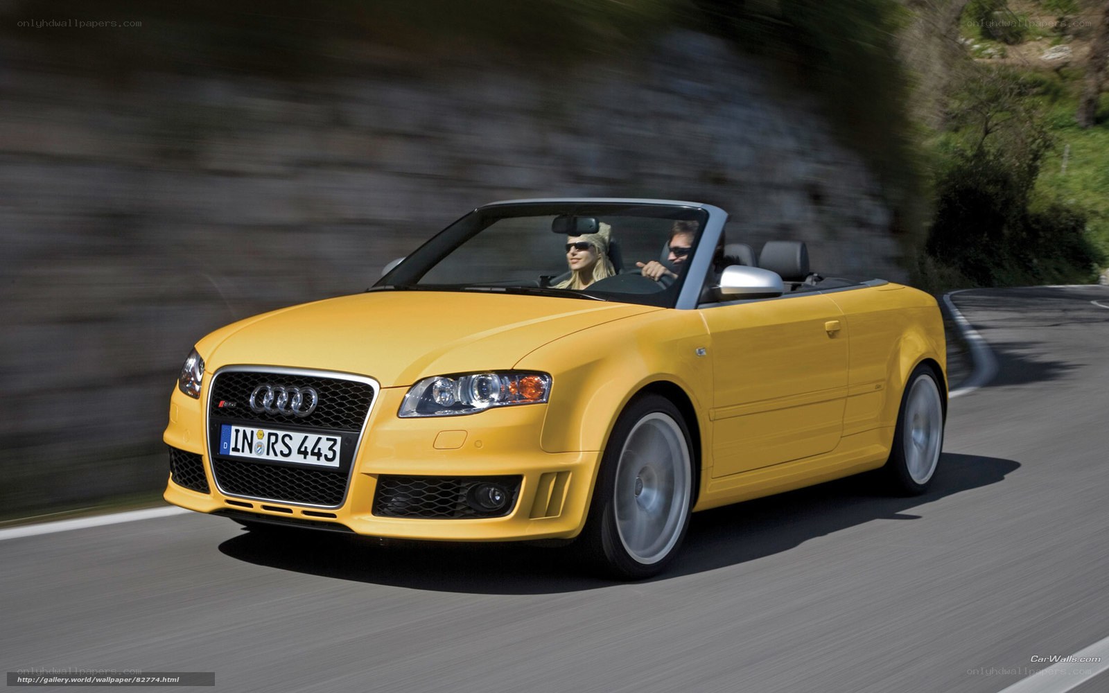 Yellow Audi RS4 convertible in motion