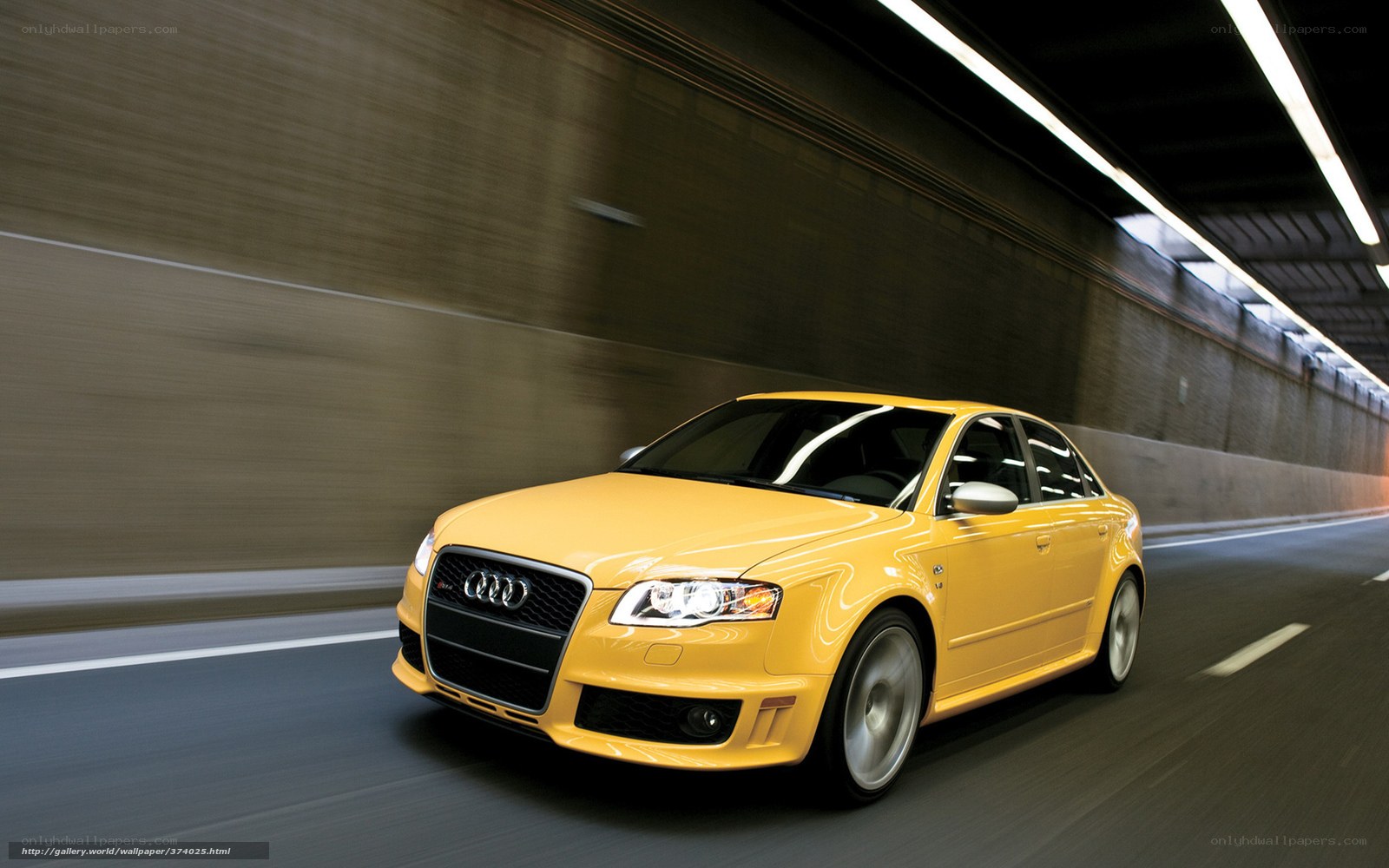 Yellow Audi RS4 in tunnel