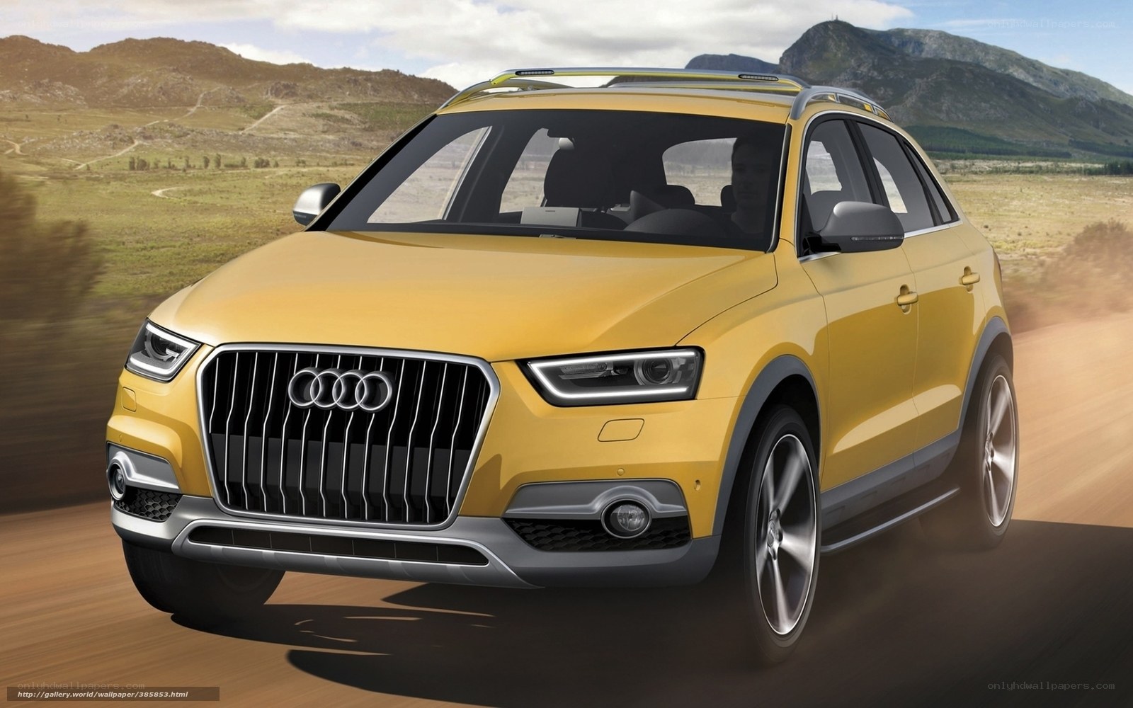 Yellow Audi SUV on a road