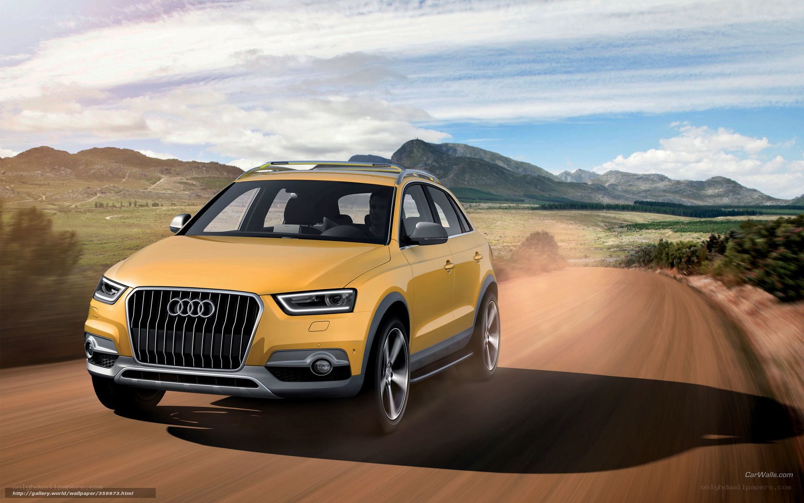 Yellow Audi SUV on dirt road