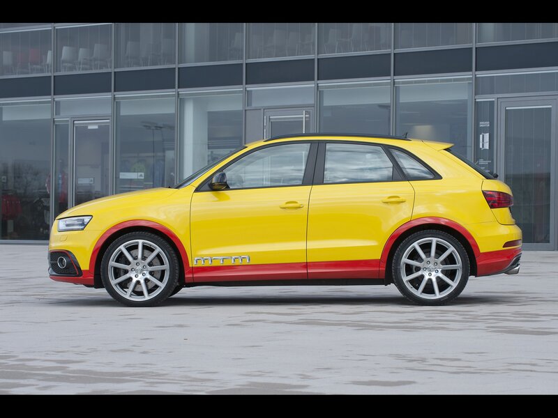 Yellow Audi SUV with red accents