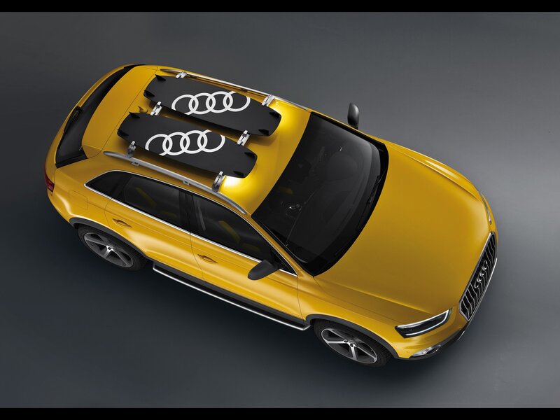 Yellow Audi SUV with roof racks