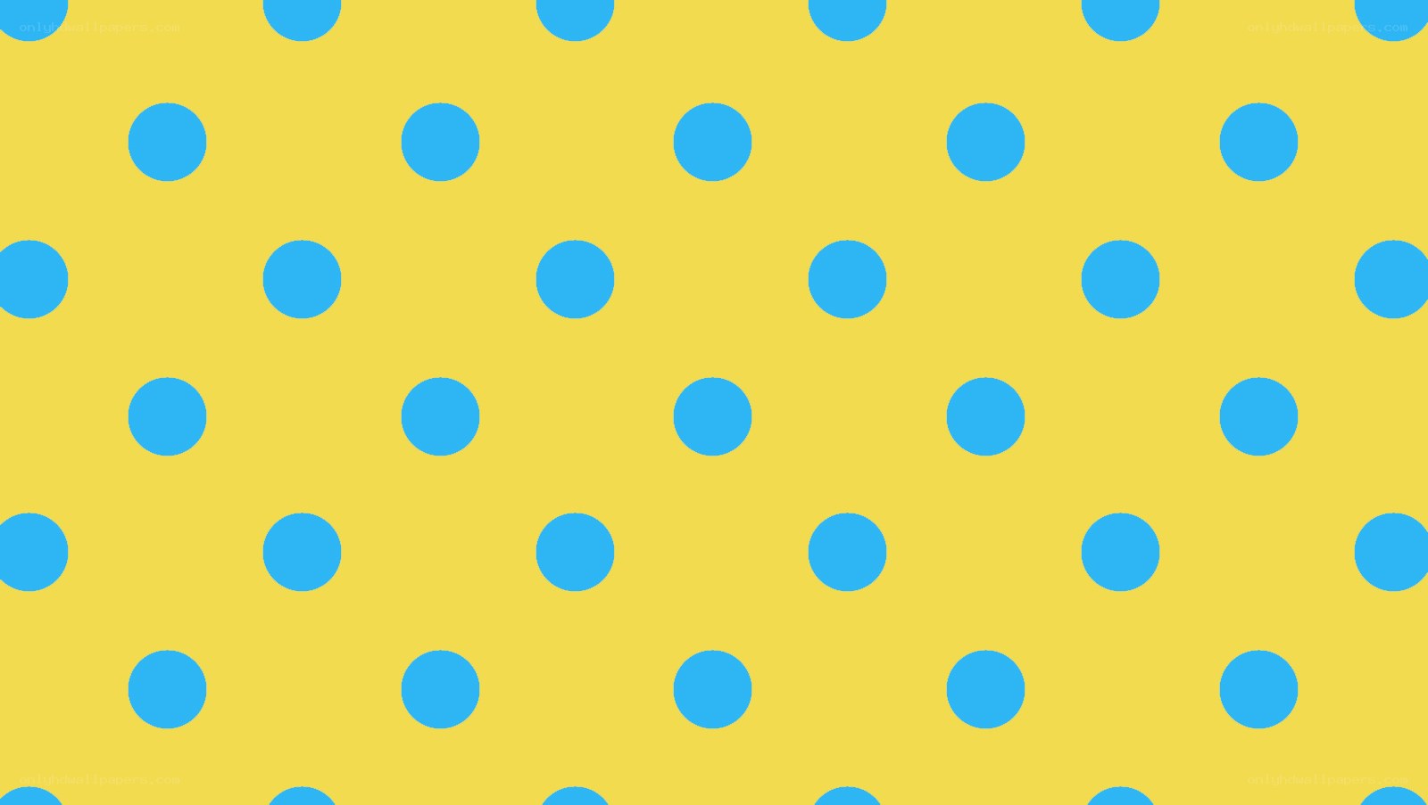 yellow background with blue polka dots