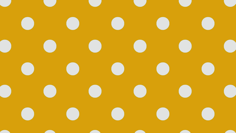 yellow background with white polka dots