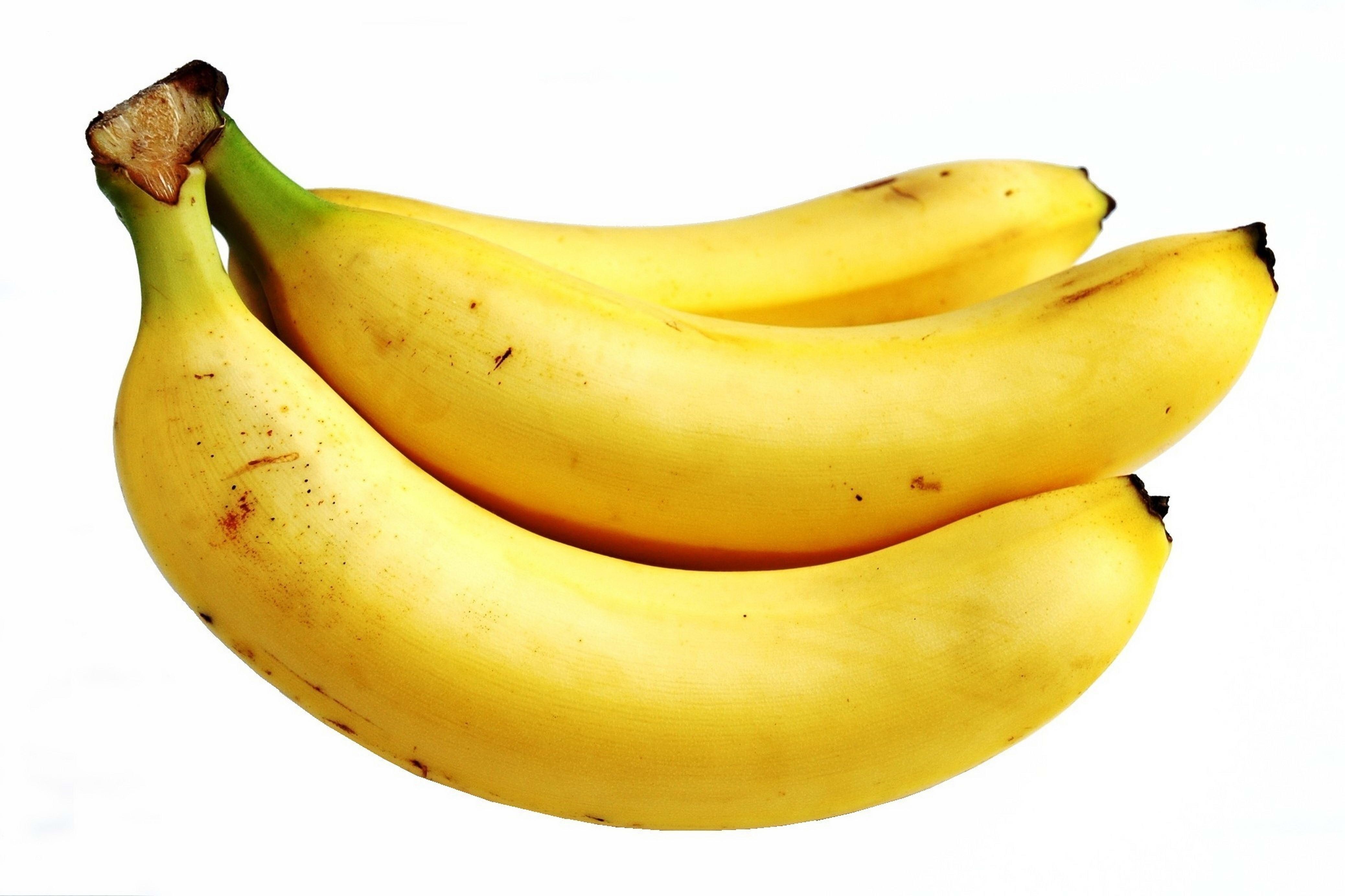 yellow bananas on white background