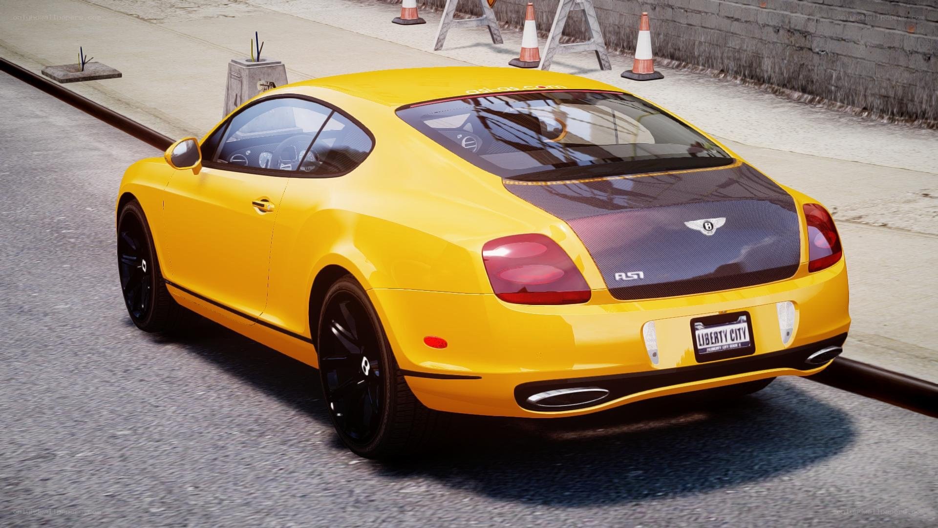 yellow bentley in city