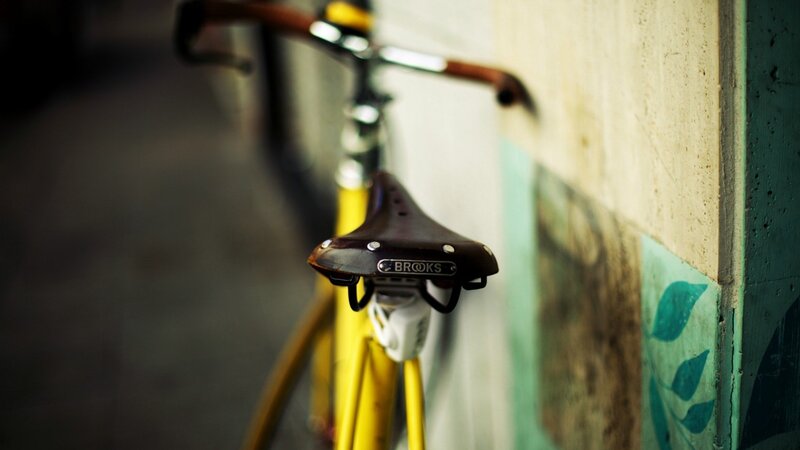 Yellow Bicycle Against Wall