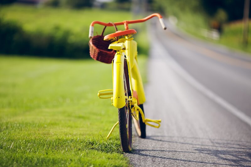 Yellow Bicycle on Road — Serene