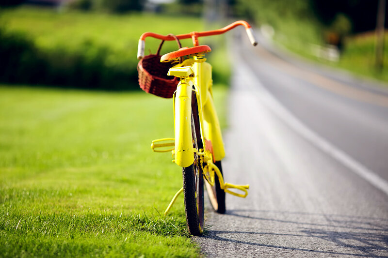 Yellow Bicycle on Road