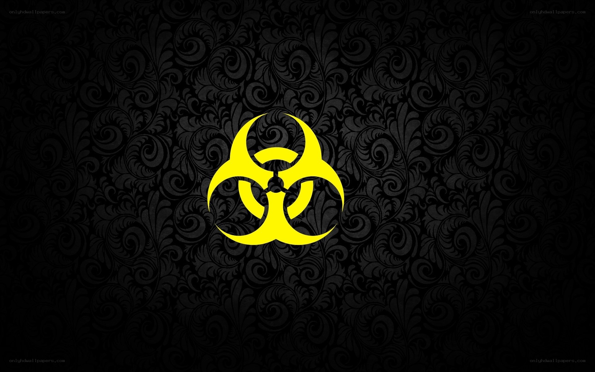 yellow biohazard symbol on black