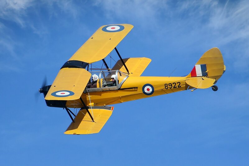 Yellow Biplane in Flight — Dynamic, Afternoon