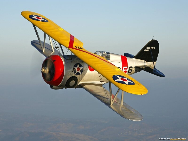 Yellow Biplane in Flight — Serene, Afternoon, Photograph, Aircraft