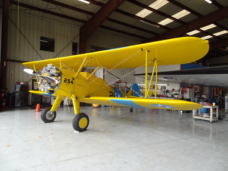 Yellow Biplane in Hangar — Calm