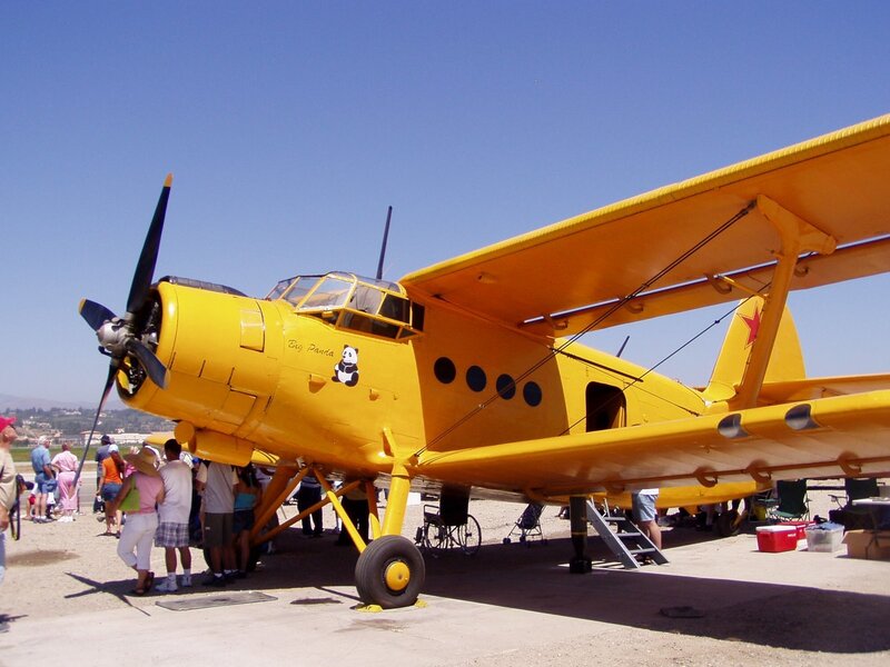 Yellow biplane on display