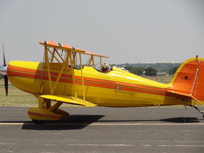Yellow Biplane on Runway — Calm