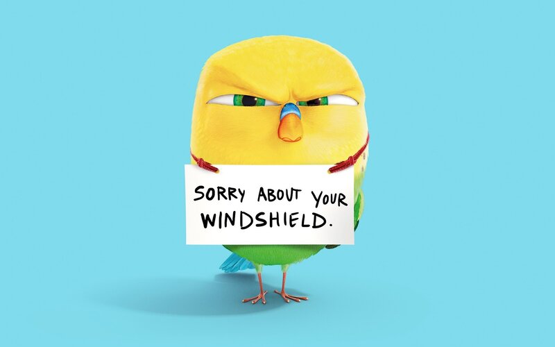 Yellow Bird Holding Sign — Playful