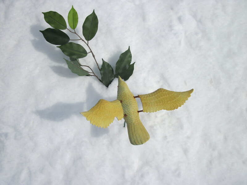 Yellow Bird in Snow