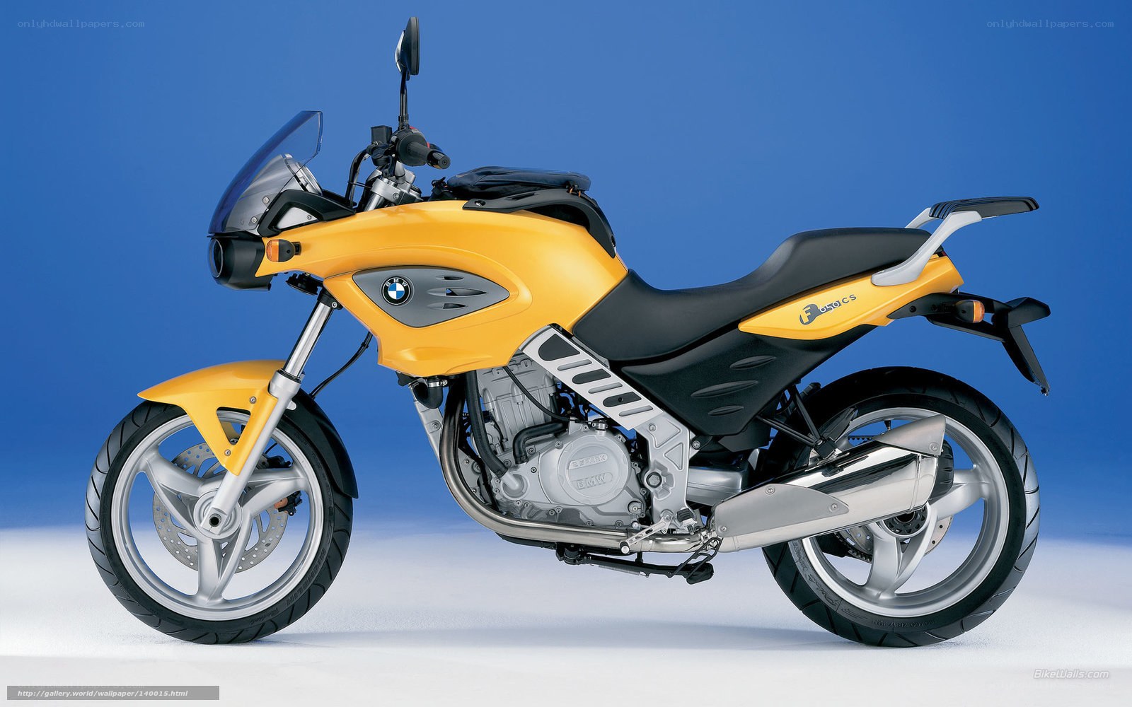 Yellow BMW C900 motorcycle