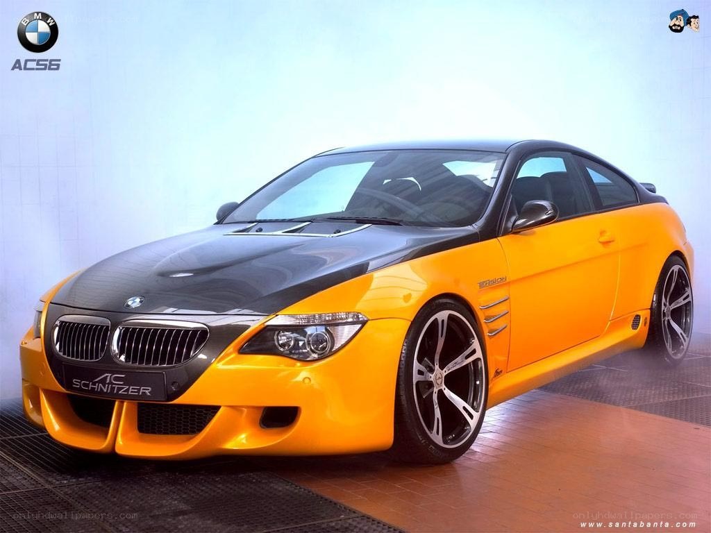 yellow bmw coupe car