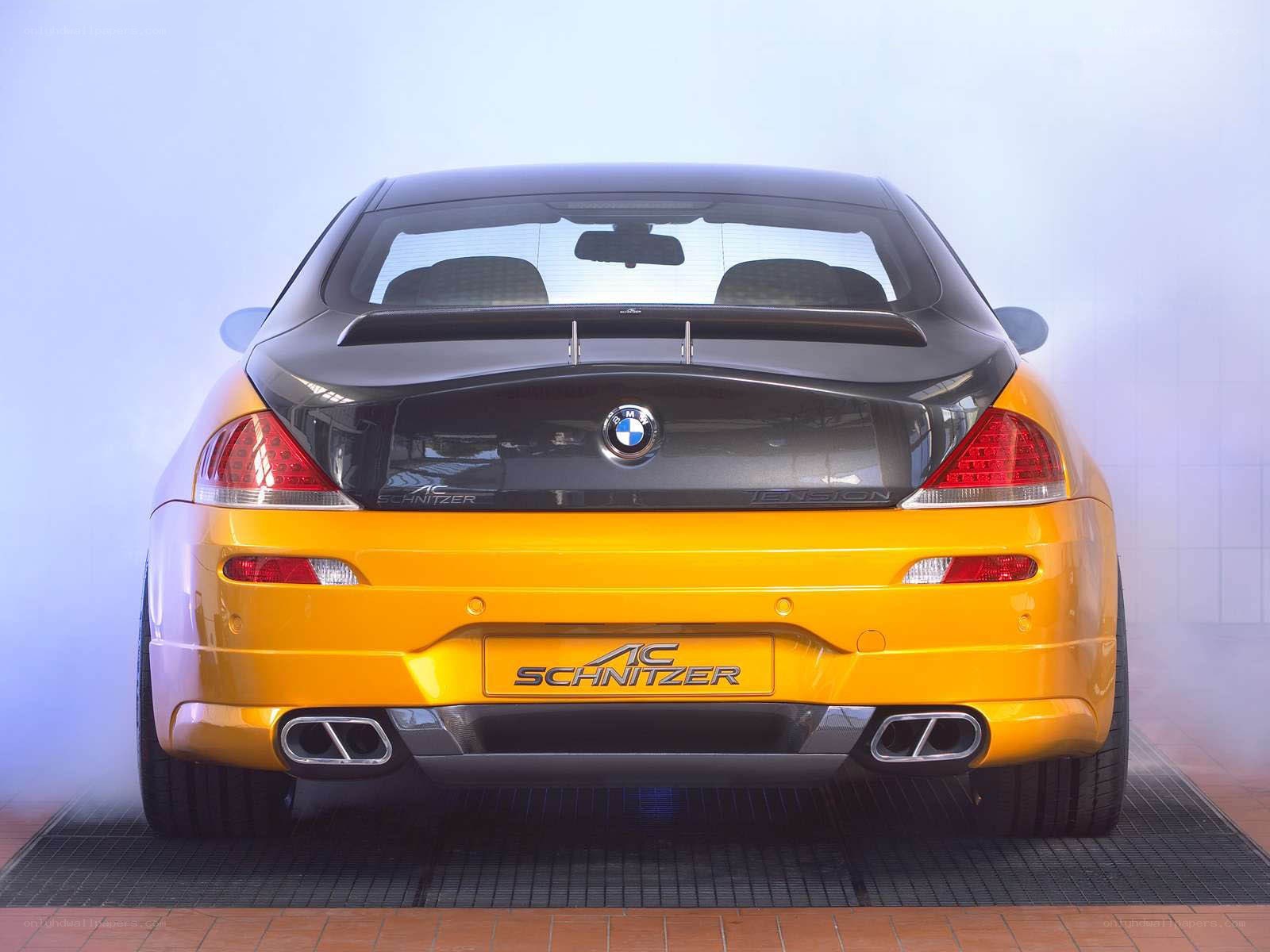 yellow bmw coupe rear view