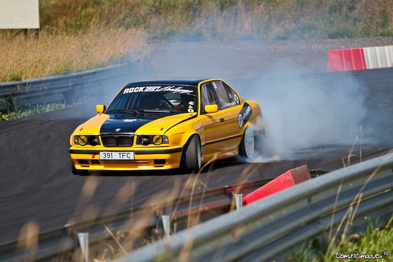 Yellow BMW drifting on track