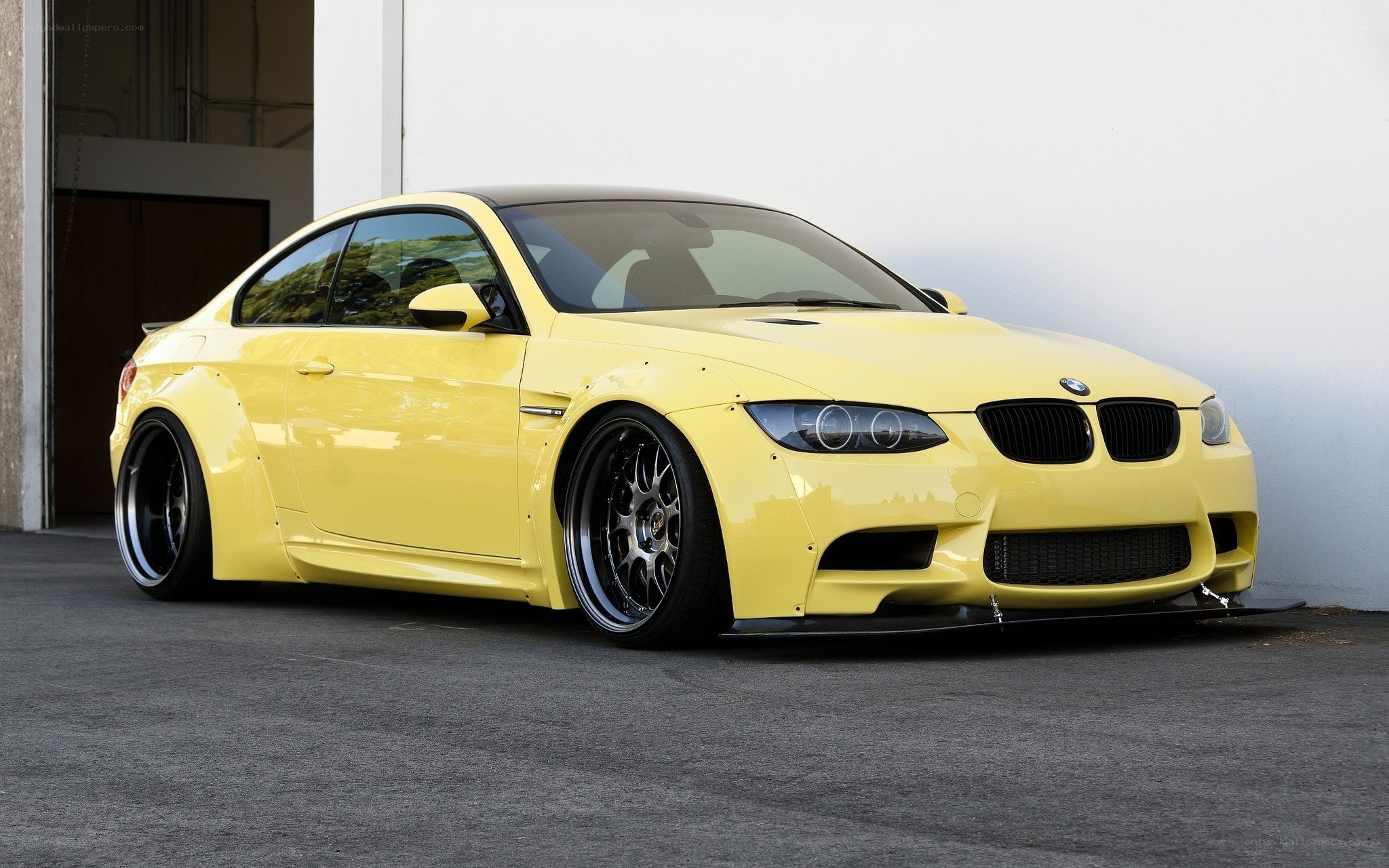 yellow bmw m3 coupe