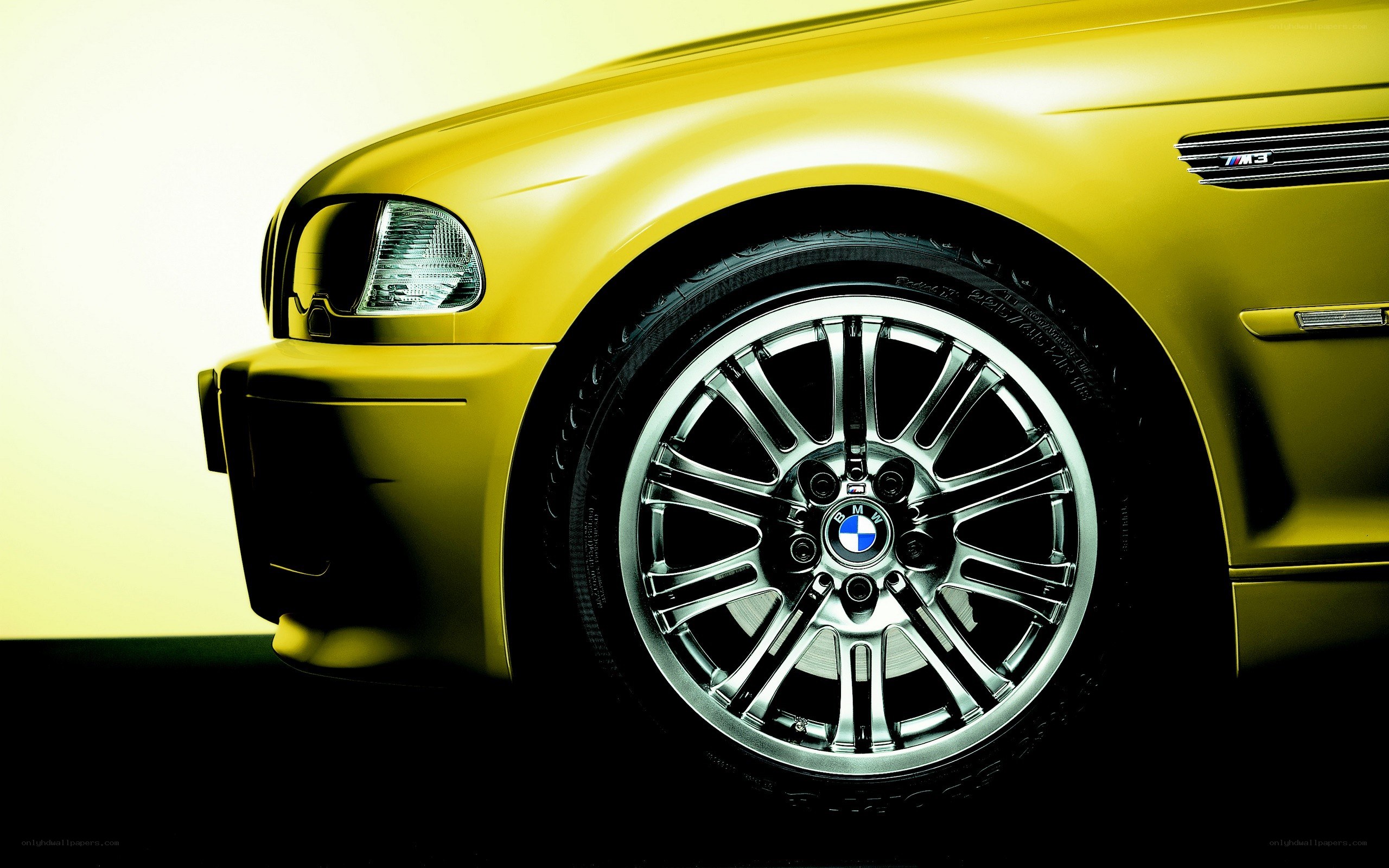 Yellow BMW M3 front wheel