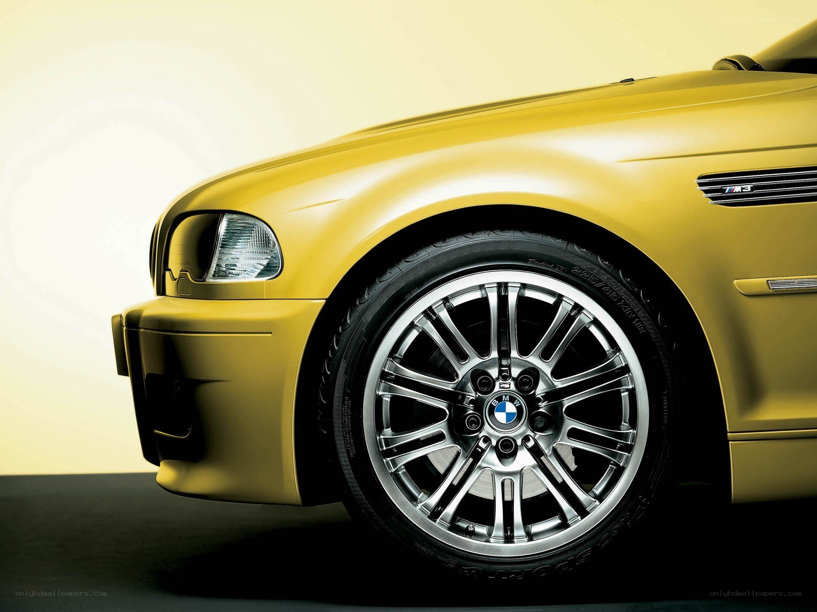 Yellow BMW M3 front wheel