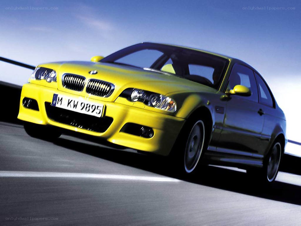 yellow bmw m3 in motion