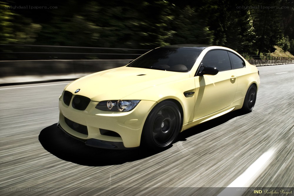 yellow bmw m3 in motion