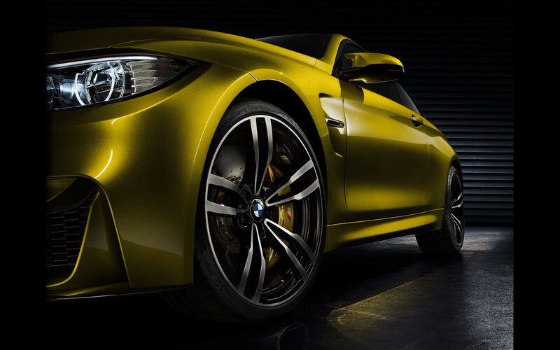 Yellow BMW M4 sports car