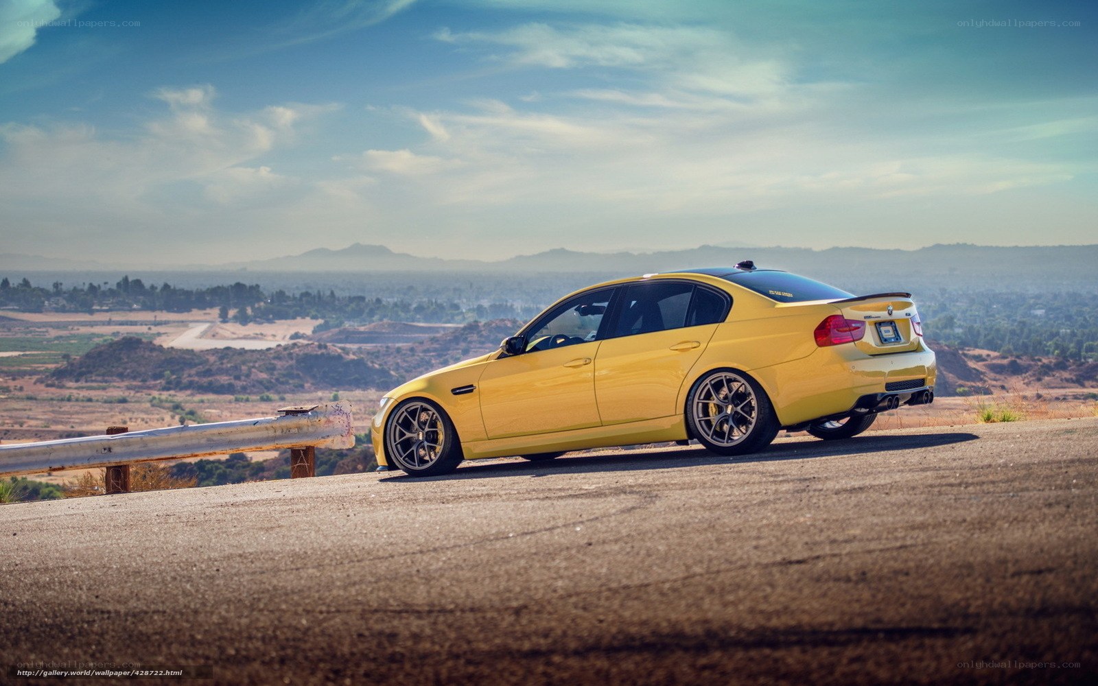 yellow bmw on a hillside