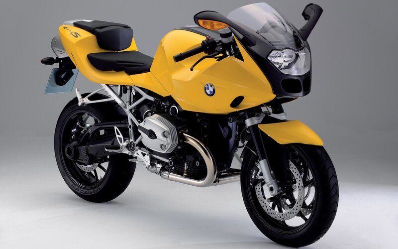 yellow BMW sport motorcycle