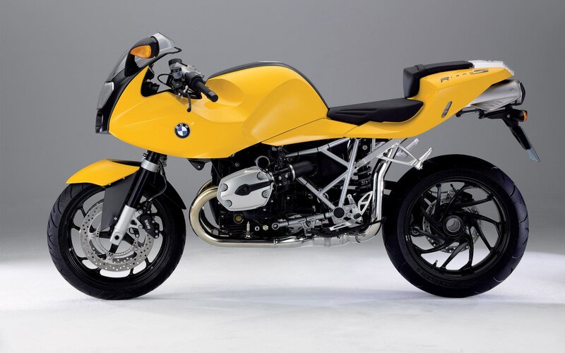 yellow BMW sport motorcycle