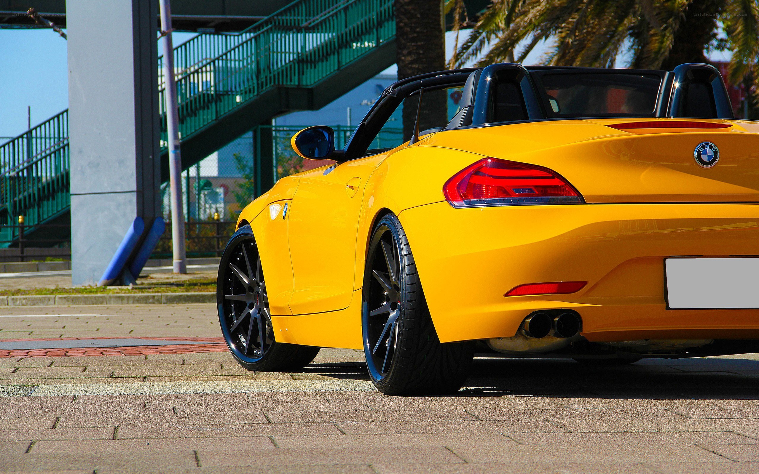 Yellow BMW Z4 convertible